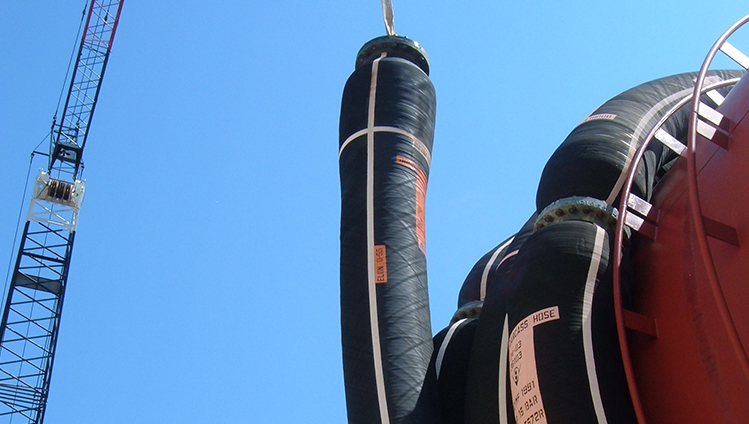 Installation d'un tuyau enrouleur caténaire anti-pollution