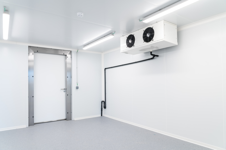 an empty industrial room refrigerator with four fans; Shutterstock ID 1935981037; purchase_order: Innenauftrag: 11000863; job: foodsafe - Innenauftrag: 11000863; client: Interior Living; other: