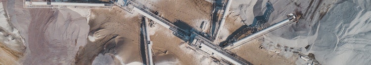 Aerial top view of crushing machinery, conveying crushed granite gravel stone in a quarry open pit mining. Processing plant for crushed stone and gravel. Mining and Quarry mining equipment.; Shutterstock ID 1405170485; purchase_order: -; job: -; client: -; other: -